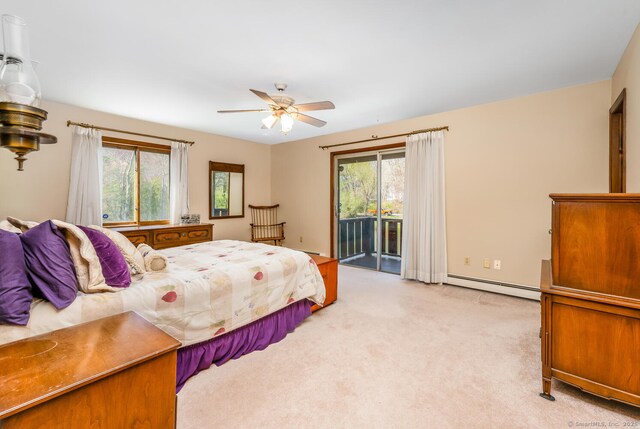 bedroom with ceiling fan, light colored carpet, access to exterior, and baseboard heating