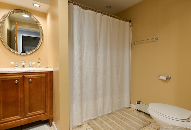 bathroom with vanity, toilet, tile patterned floors, recessed lighting, and a baseboard radiator