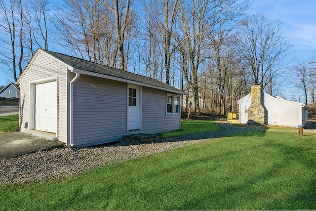 16 Old Hawleyville Rd, Newtown, CT 06470 - exterior space featuring an outbuilding, a detached garage, and aphalt driveway