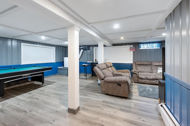 game room with a decorative wall, a baseboard radiator, coffered ceiling, and wood finished floors