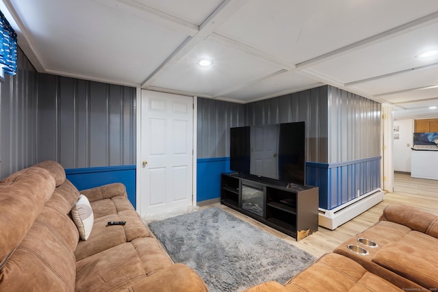living area featuring recessed lighting, baseboard heating, and wood finished floors