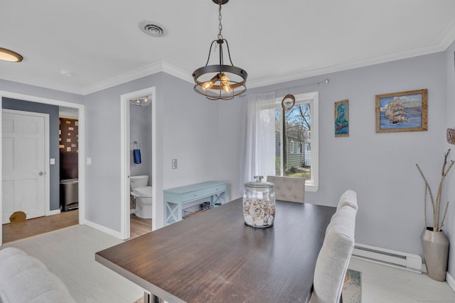 dining area featuring baseboards, visible vents, a baseboard heating unit, and crown molding