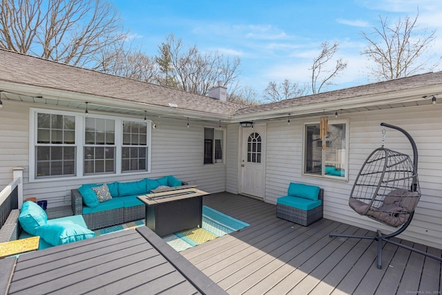 wooden deck featuring outdoor lounge area