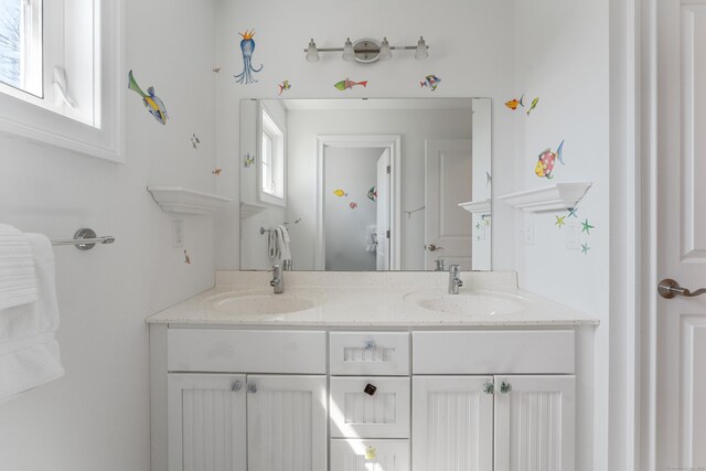 6 Holdridge Ct, Groton, CT 06355 - bathroom with double vanity and a sink
