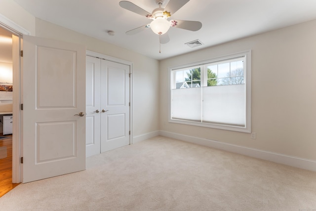 6 Holdridge Ct, Groton, CT 06355 - unfurnished bedroom with carpet flooring, visible vents, a closet, and baseboards