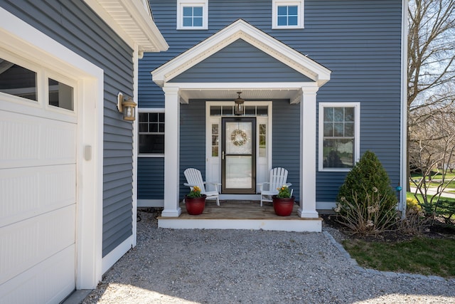 6 Holdridge Ct, Groton, CT 06355 - doorway to property featuring a porch