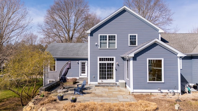 6 Holdridge Ct, Groton, CT 06355 - back of house featuring a shingled roof, entry steps, and a patio area