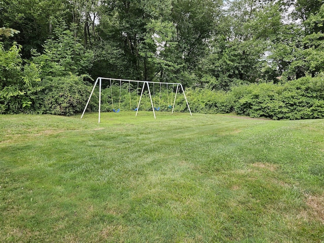 view of yard featuring playground community