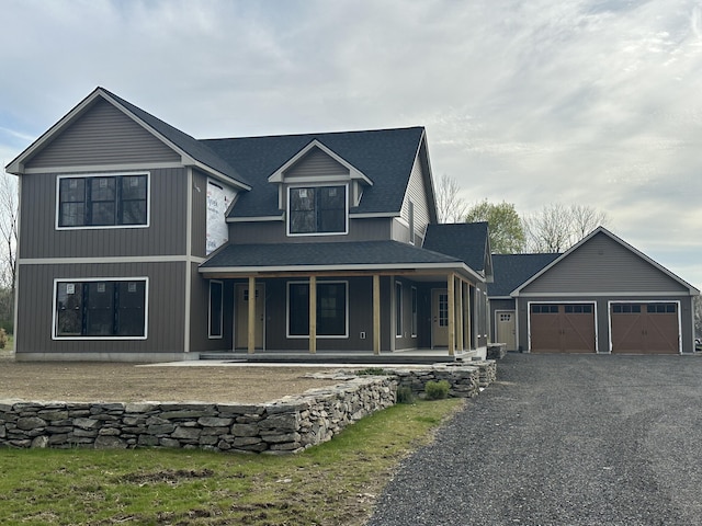 289 Moosup Pond Rd, Plainfield, CT 06354 - view of front of home featuring aphalt driveway, roof with shingles, a porch, and an attached garage