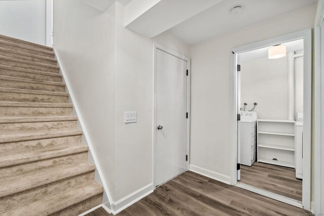 268 Lawlor St Apt 6, New Britain, CT 06051 - stairs featuring wood finished floors and washer / dryer