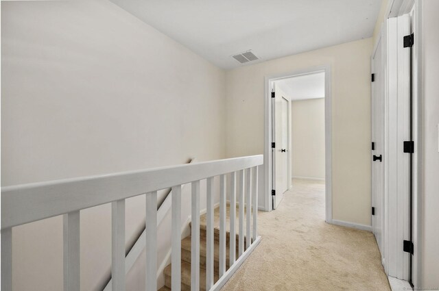 268 Lawlor St Apt 6, New Britain, CT 06051 - hallway with light colored carpet and baseboards