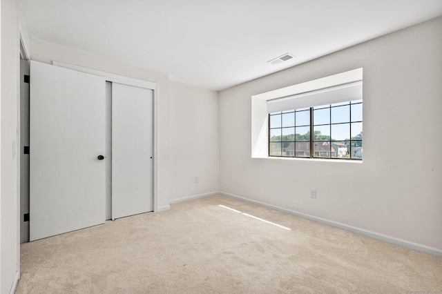 268 Lawlor St Apt 6, New Britain, CT 06051 - unfurnished bedroom featuring carpet flooring and a closet