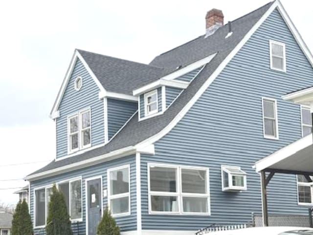 4 Culver Ct, Naugatuck, CT 06770 - exterior space with a chimney and roof with shingles