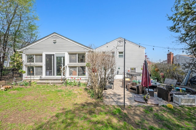 9 Berkshire Dr, Danbury, CT 06811 - back of house featuring a sunroom, a patio area, fence, and a yard