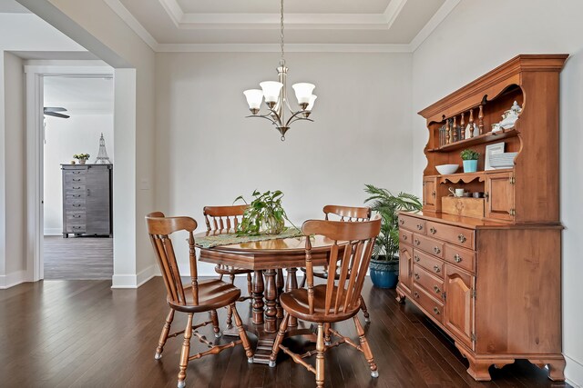 14 Enclave Cir Unit 14, Newtown, CT 06470 - dining area with crown molding, dark wood finished floors, baseboards, an inviting chandelier, and a tray ceiling