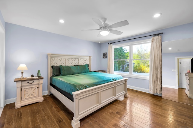 bedroom featuring baseboards, a ceiling fan, recessed lighting, and dark wood-type flooring