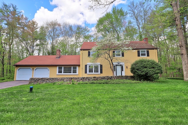 30 Sunset Hill Rd, Simsbury, CT 06070 - colonial inspired home with a chimney, driveway, and a front yard