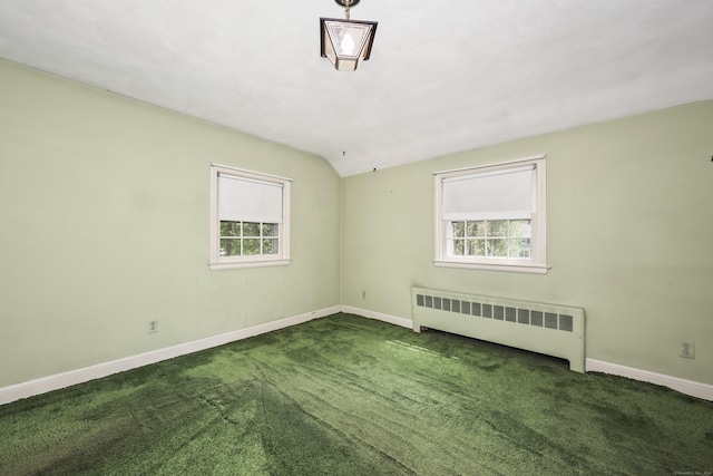 30 Sunset Hill Rd, Simsbury, CT 06070 - spare room with radiator heating unit, baseboards, carpet floors, and vaulted ceiling