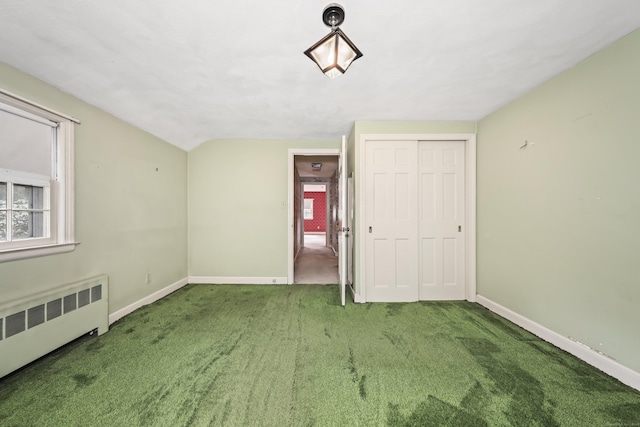 30 Sunset Hill Rd, Simsbury, CT 06070 - unfurnished bedroom featuring radiator, carpet floors, baseboards, and lofted ceiling