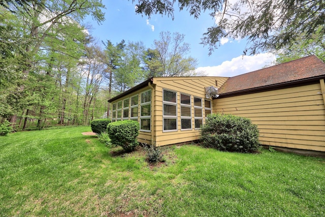 30 Sunset Hill Rd, Simsbury, CT 06070 - view of home's exterior featuring a lawn and a sunroom