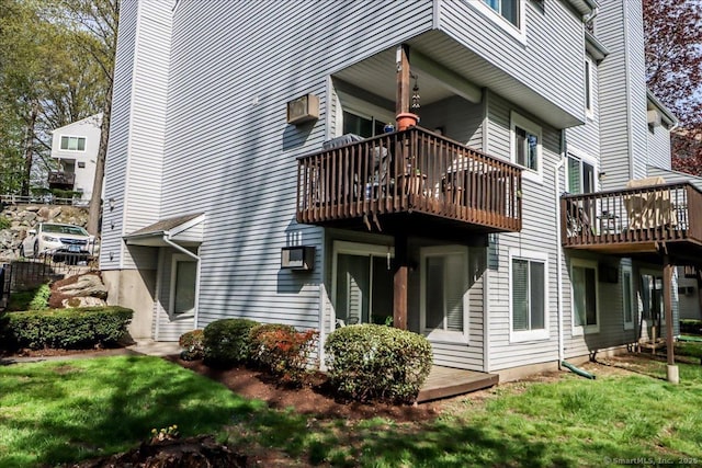 20 E Pembroke Rd Unit 36, Danbury, CT 06811 - back of house with a yard, a balcony, and a chimney