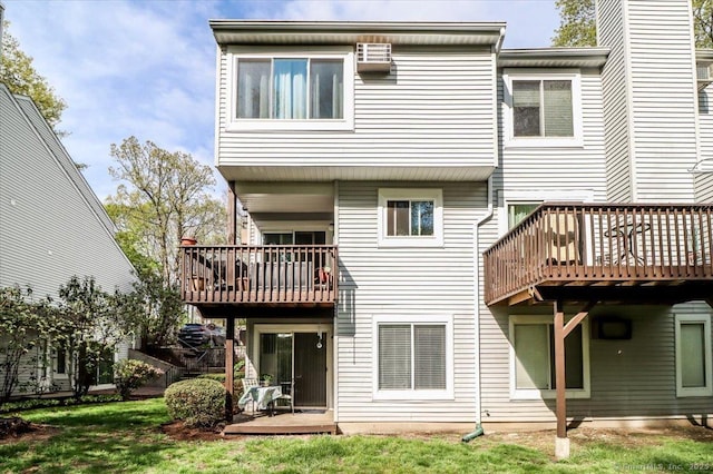 20 E Pembroke Rd Unit 36, Danbury, CT 06811 - back of property with a wooden deck, a yard, and a balcony