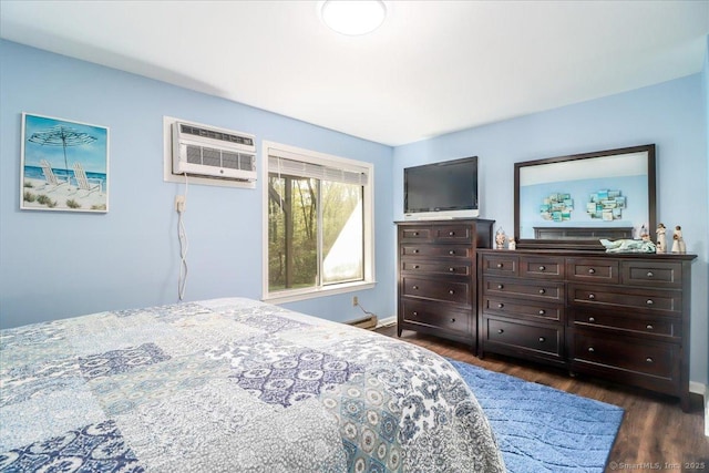 20 E Pembroke Rd Unit 36, Danbury, CT 06811 - bedroom with baseboards, dark wood finished floors, and a wall mounted air conditioner