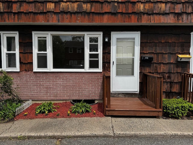 136 Westbury Park Rd Apt C, Watertown, CT 06795 - property entrance with brick siding