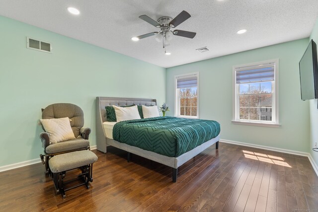 bedroom featuring baseboards, visible vents, and recessed lighting