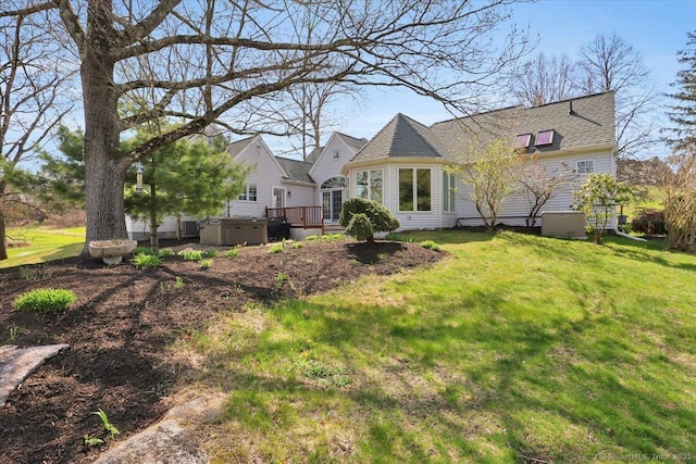 496 Foote Rd, Glastonbury, CT 06073 - rear view of property with a wooden deck and a yard