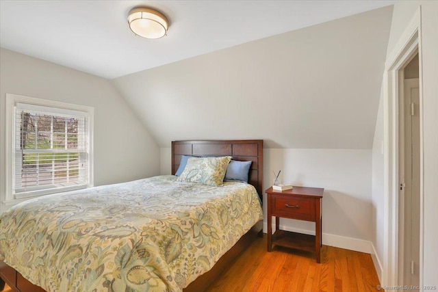 496 Foote Rd, Glastonbury, CT 06073 - bedroom with baseboards, wood finished floors, and vaulted ceiling