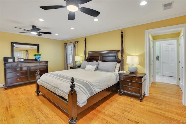 496 Foote Rd, Glastonbury, CT 06073 - bedroom with crown molding, recessed lighting, visible vents, and light wood-style flooring