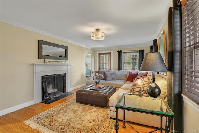 496 Foote Rd, Glastonbury, CT 06073 - living room with baseboards, ornamental molding, wood finished floors, and a fireplace with flush hearth