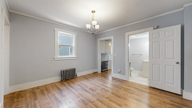 40 Penobscot St, Norwich, CT 06360 - interior space featuring a chandelier, radiator, light wood-style floors, and crown molding