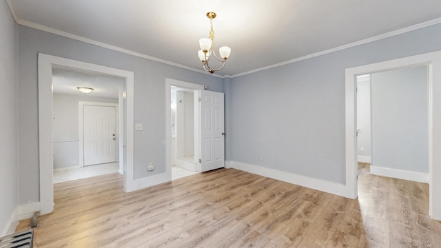 40 Penobscot St, Norwich, CT 06360 - empty room with a chandelier, baseboards, light wood-style floors, and crown molding