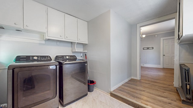 40 Penobscot St, Norwich, CT 06360 - laundry area featuring washer and clothes dryer, cabinet space, and baseboards