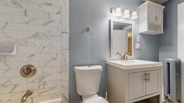 40 Penobscot St, Norwich, CT 06360 - full bathroom with toilet, radiator heating unit, and vanity