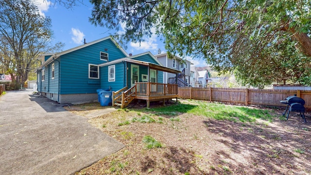 40 Penobscot St, Norwich, CT 06360 - rear view of property with a deck and a fenced backyard