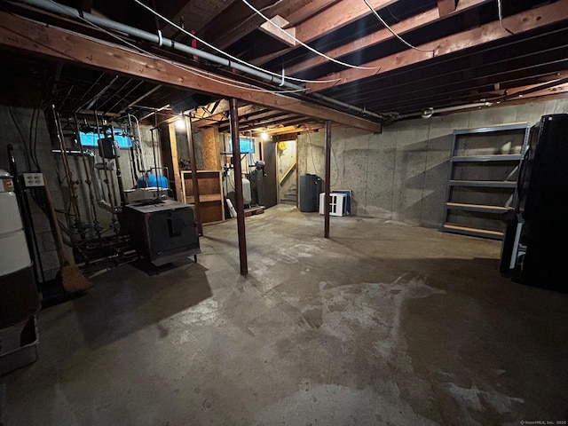 unfinished basement featuring stairway