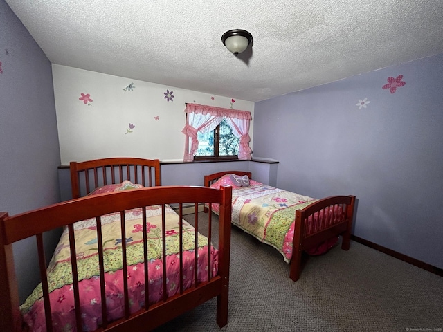 carpeted bedroom featuring a baseboard radiator and a textured ceiling