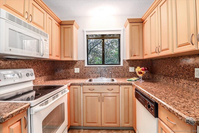 79 Heritage Vlg Unit B, Southbury, CT 06488 - kitchen featuring white appliances, a textured ceiling, backsplash, and a sink