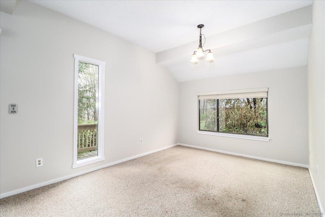 79 Heritage Vlg Unit B, Southbury, CT 06488 - carpeted empty room featuring vaulted ceiling, a wealth of natural light, a chandelier, and baseboards