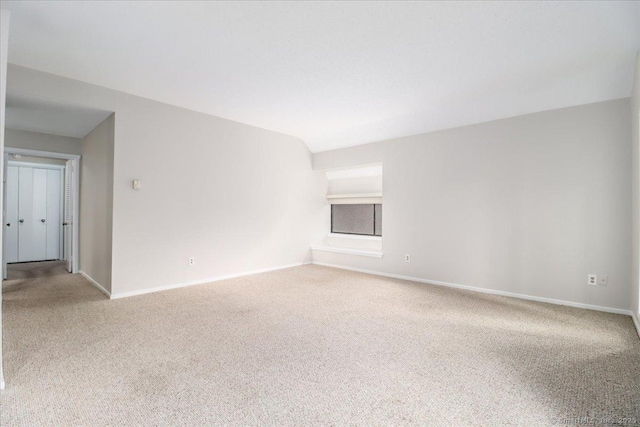 79 Heritage Vlg Unit B, Southbury, CT 06488 - carpeted spare room featuring baseboards