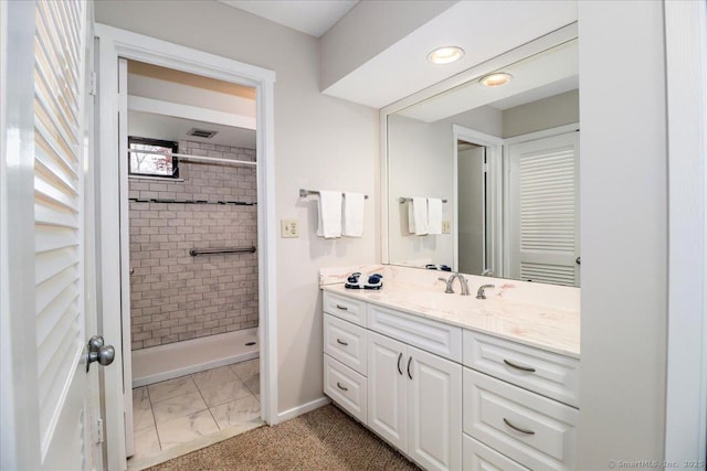 79 Heritage Vlg Unit B, Southbury, CT 06488 - bathroom with a shower stall, vanity, marble finish floor, visible vents, and baseboards