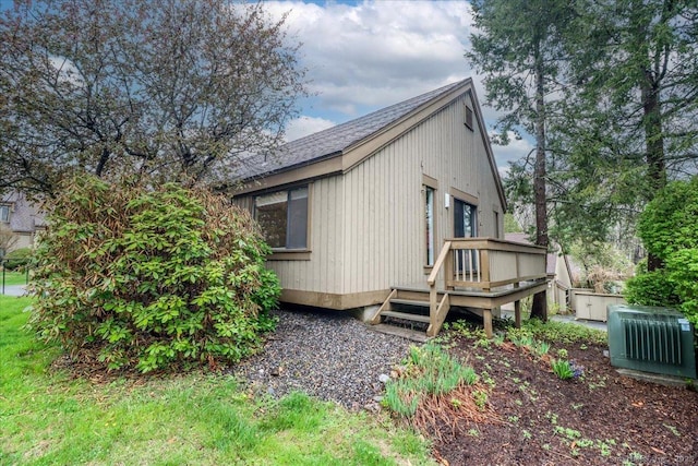 79 Heritage Vlg Unit B, Southbury, CT 06488 - view of home's exterior featuring a deck and roof with shingles