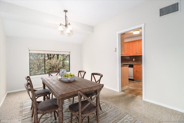 79 Heritage Vlg Unit B, Southbury, CT 06488 - dining room with light colored carpet, visible vents, a notable chandelier, and baseboards