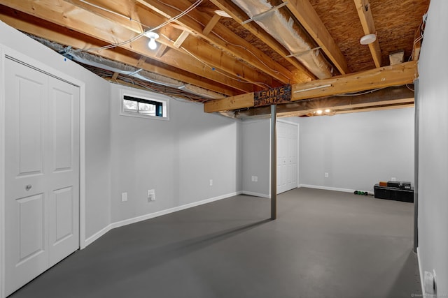 below grade area featuring baseboards