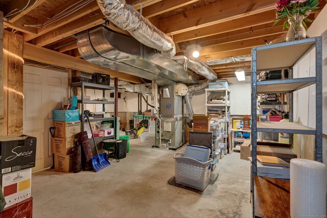 storage room featuring heating unit