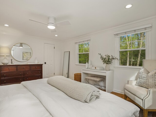 bedroom with recessed lighting, baseboards, ornamental molding, and ceiling fan