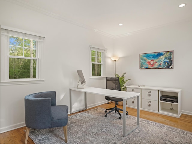 office area featuring recessed lighting, baseboards, ornamental molding, and light wood finished floors